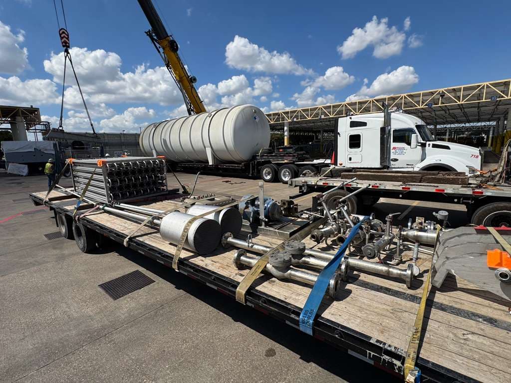 Cryogenic tank and piping loaded on flatbed for certified transport